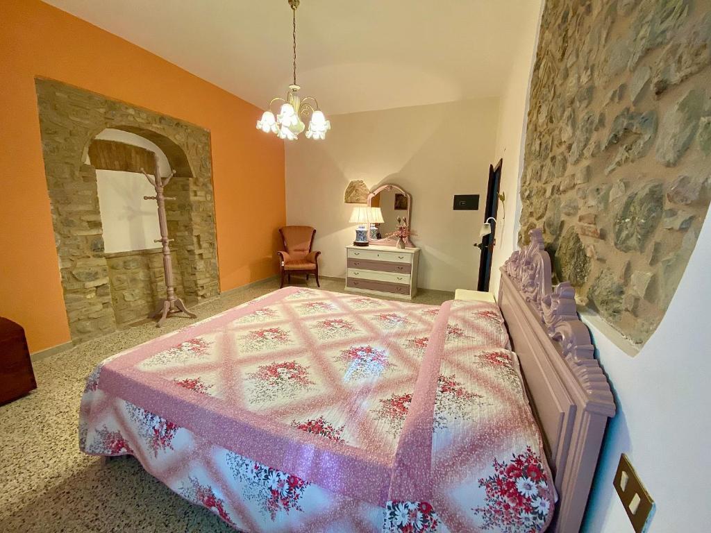 Postel nebo postele na pokoji v ubytování Agriturismo L'Antica Quercia