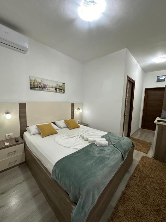Postel nebo postele na pokoji v ubytování Apartments Amar