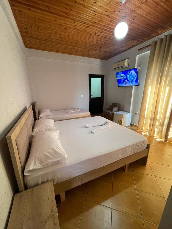 Postel nebo postele na pokoji v ubytování Sea View te Shero