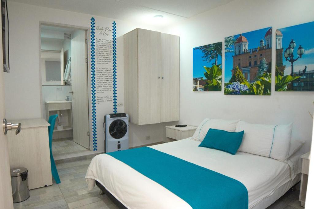 Postel nebo postele na pokoji v ubytování Almaviva Casa Hotel