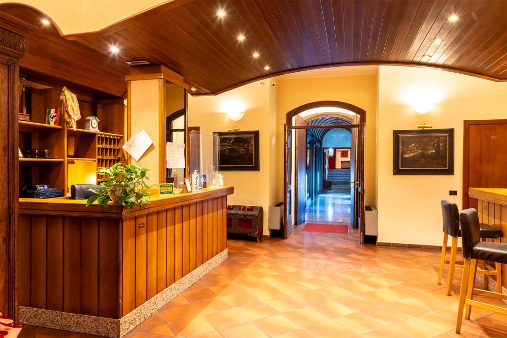 TV a/nebo společenská místnost v ubytování Hotel Vecchio Casello