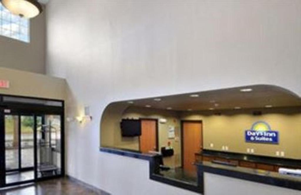 a lobby of a hospital with a sign on the wall at Days Inn by Wyndham Lubbock South in Lubbock