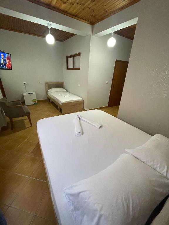 Postel nebo postele na pokoji v ubytování Sea View te Shero