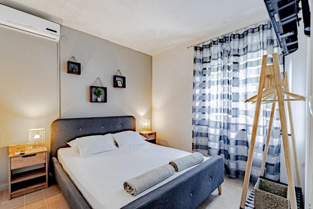 Postel nebo postele na pokoji v ubytování Vrbovica apartment