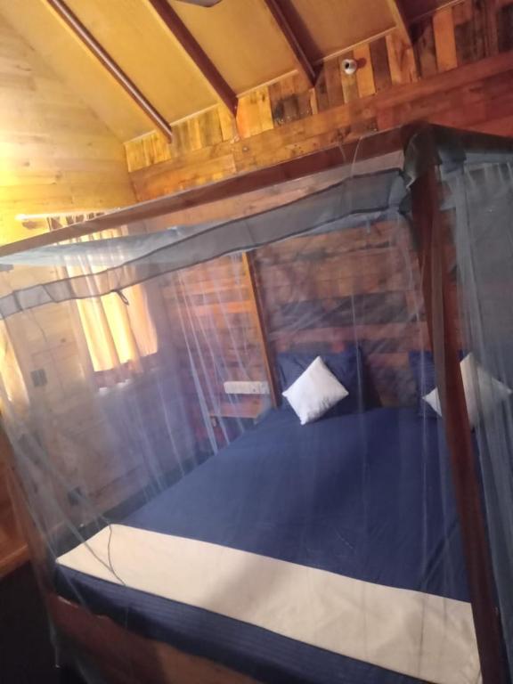 Postel nebo postele na pokoji v ubytování Silaa Cabana