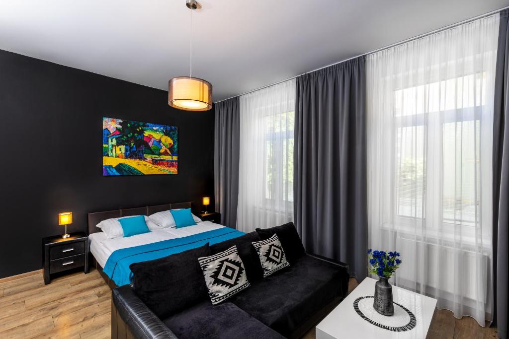 A bed or beds in a room at Skackavá - beautiful new apartment in direct centrum, 24h self check-in
