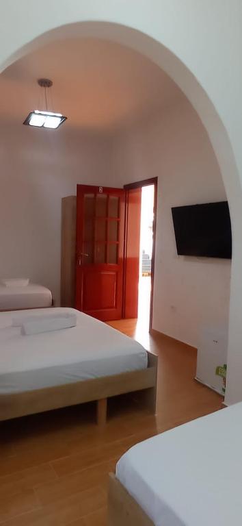 Postel nebo postele na pokoji v ubytování Sea View te Shero