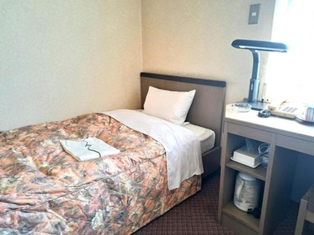 Postel nebo postele na pokoji v ubytování Hotel Tetora Higashimuroran - Vacation STAY 75844v