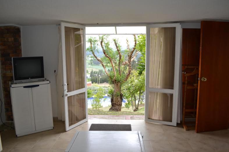 Kuchyň nebo kuchyňský kout v ubytování Miravalle Suites