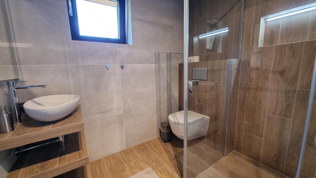 Koupelna v ubytování Chalets Hrabovo