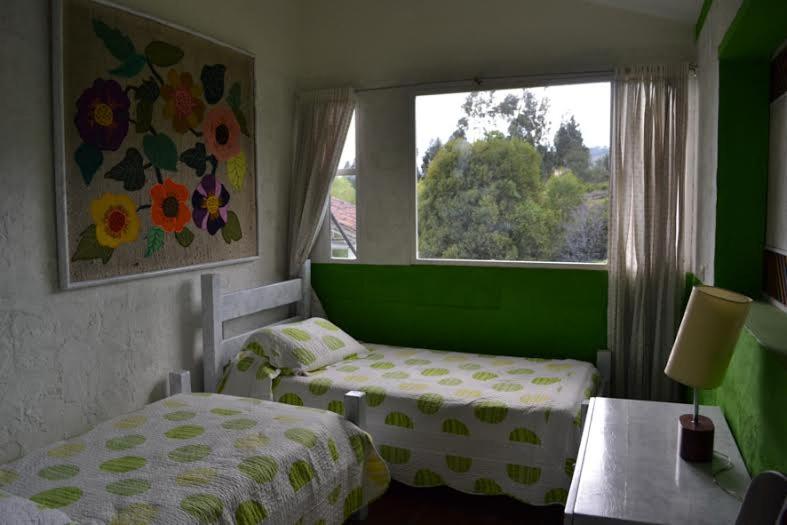 Postel nebo postele na pokoji v ubytování Miravalle Suites