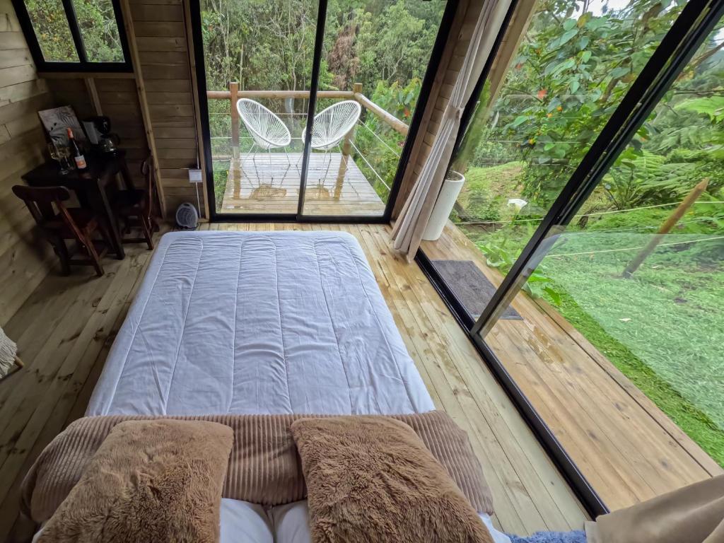Postel nebo postele na pokoji v ubytování Rùstico Glamping