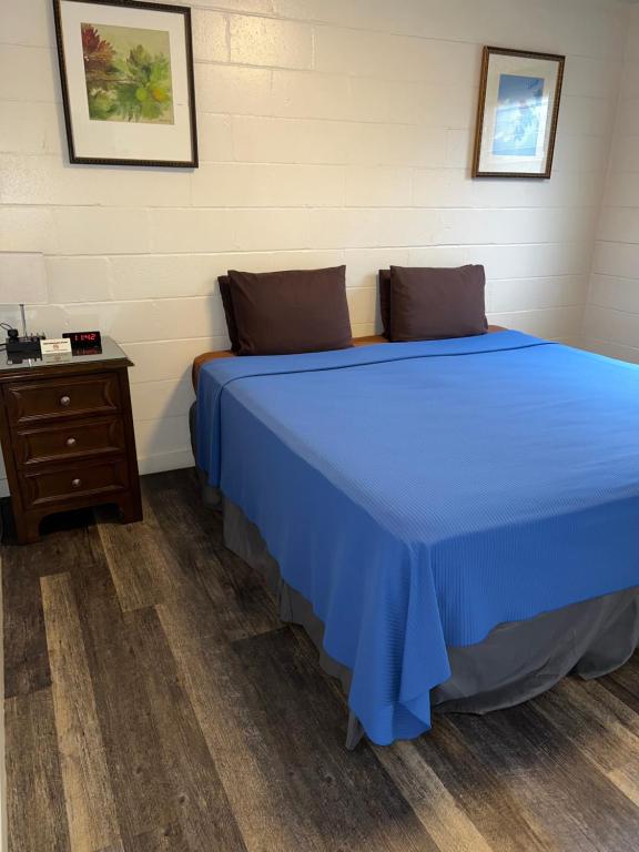 Postel nebo postele na pokoji v ubytování Tip Top Motel