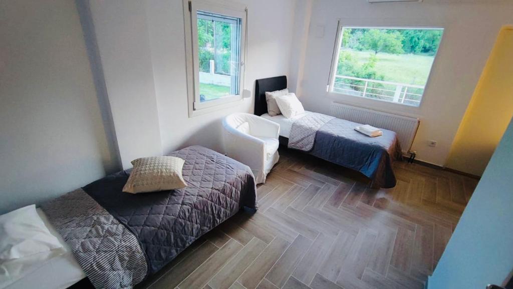 Postel nebo postele na pokoji v ubytování Anesi Suites & Rooms