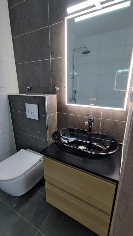 Koupelna v ubytování Anesi Suites & Rooms