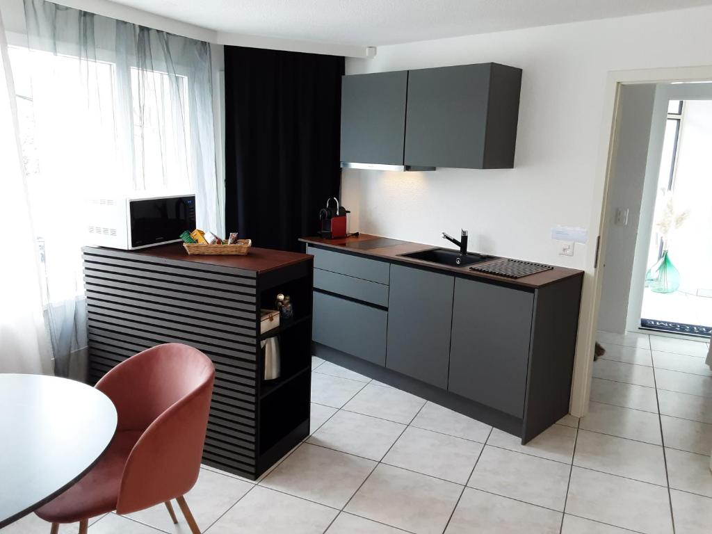 Kuchyň nebo kuchyňský kout v ubytování Moderne Gästesuite