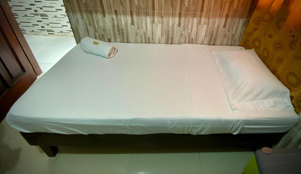 Postel nebo postele na pokoji v ubytování Hotel Rancho Grande