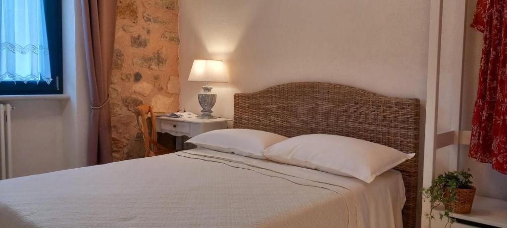 Postel nebo postele na pokoji v ubytování B&B Casa Anaceta