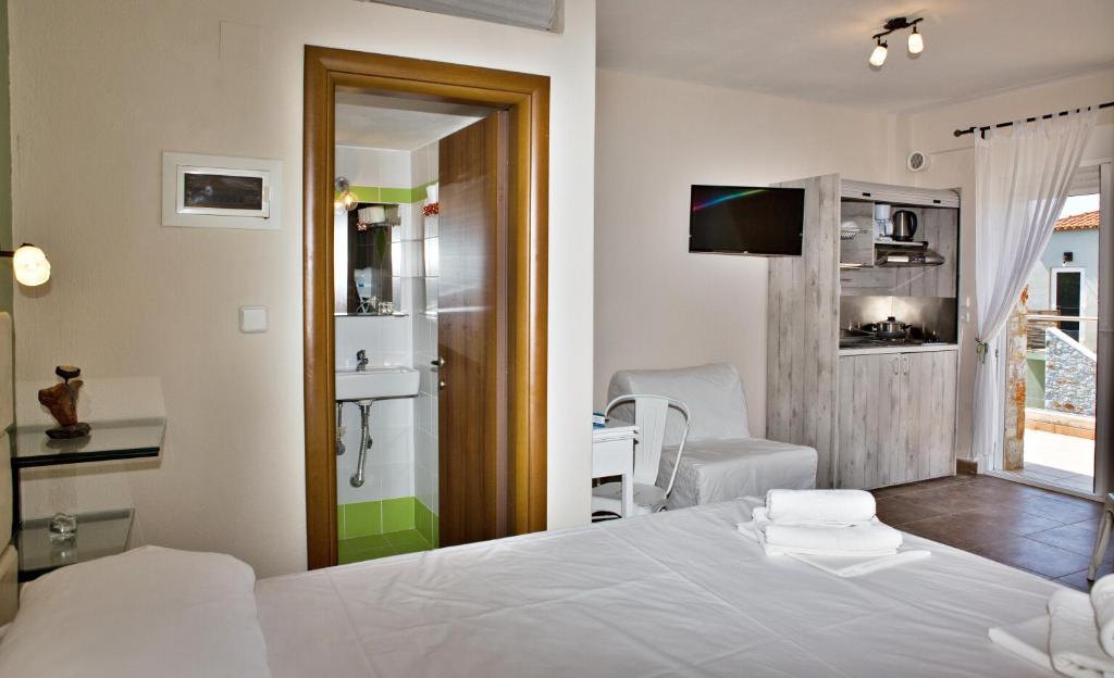 Postel nebo postele na pokoji v ubytování Axion Esti Apartments