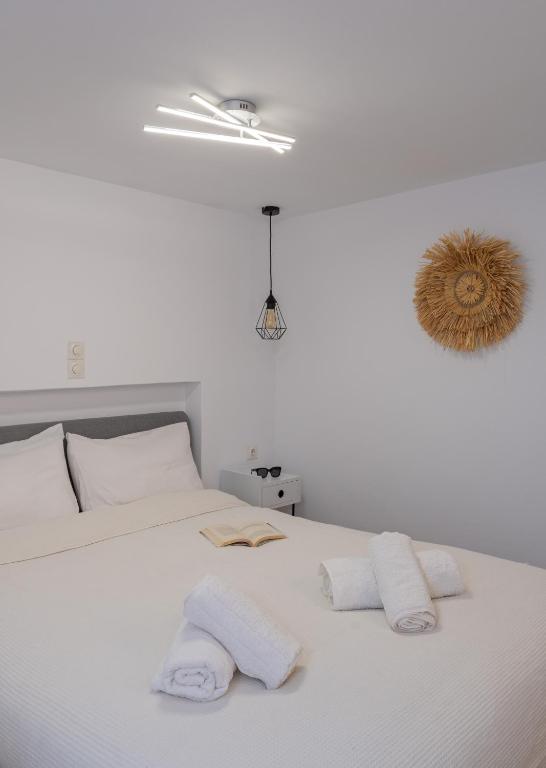 Postel nebo postele na pokoji v ubytování Cozy Residence