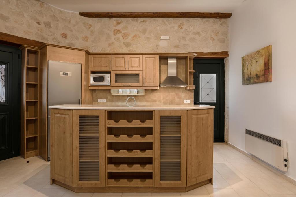 Kuchyň nebo kuchyňský kout v ubytování DANDELION stone house