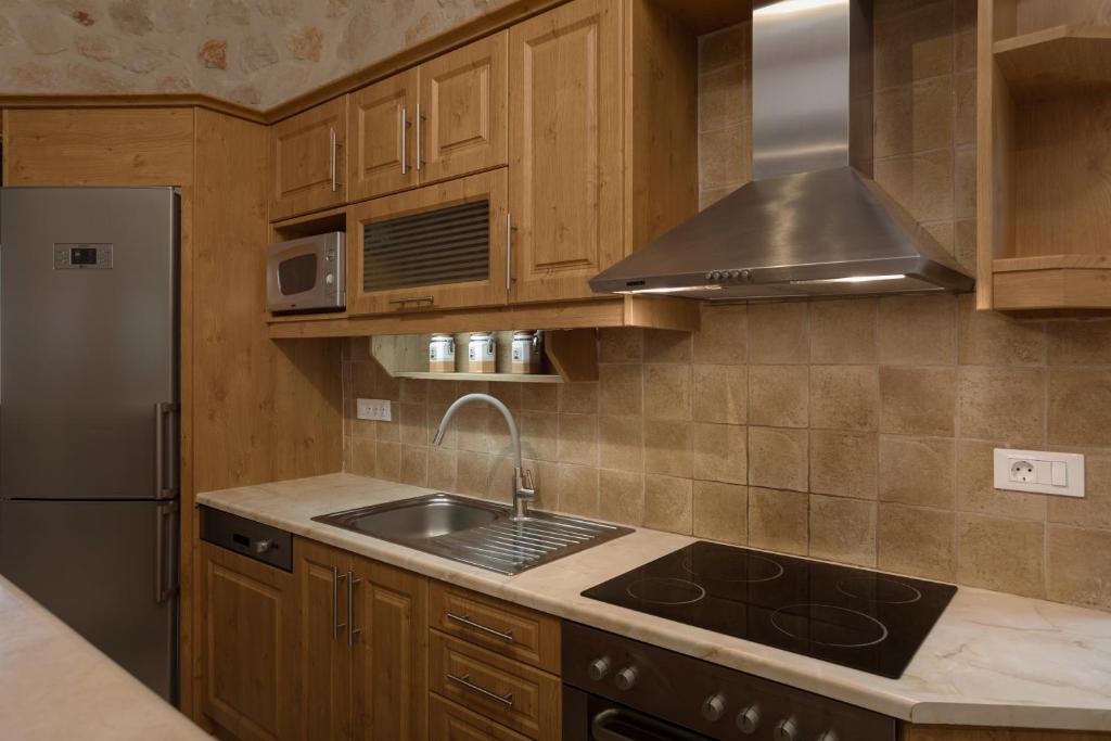 Kuchyň nebo kuchyňský kout v ubytování DANDELION stone house