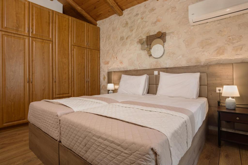 Postel nebo postele na pokoji v ubytování DANDELION stone house