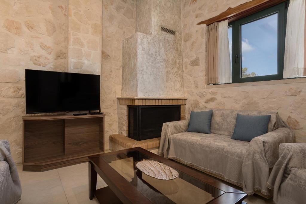 TV a/nebo společenská místnost v ubytování DANDELION stone house