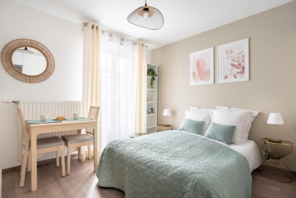 Llit o llits en una habitació de Sunny apartment near Disneyland Paris – Liz Appart