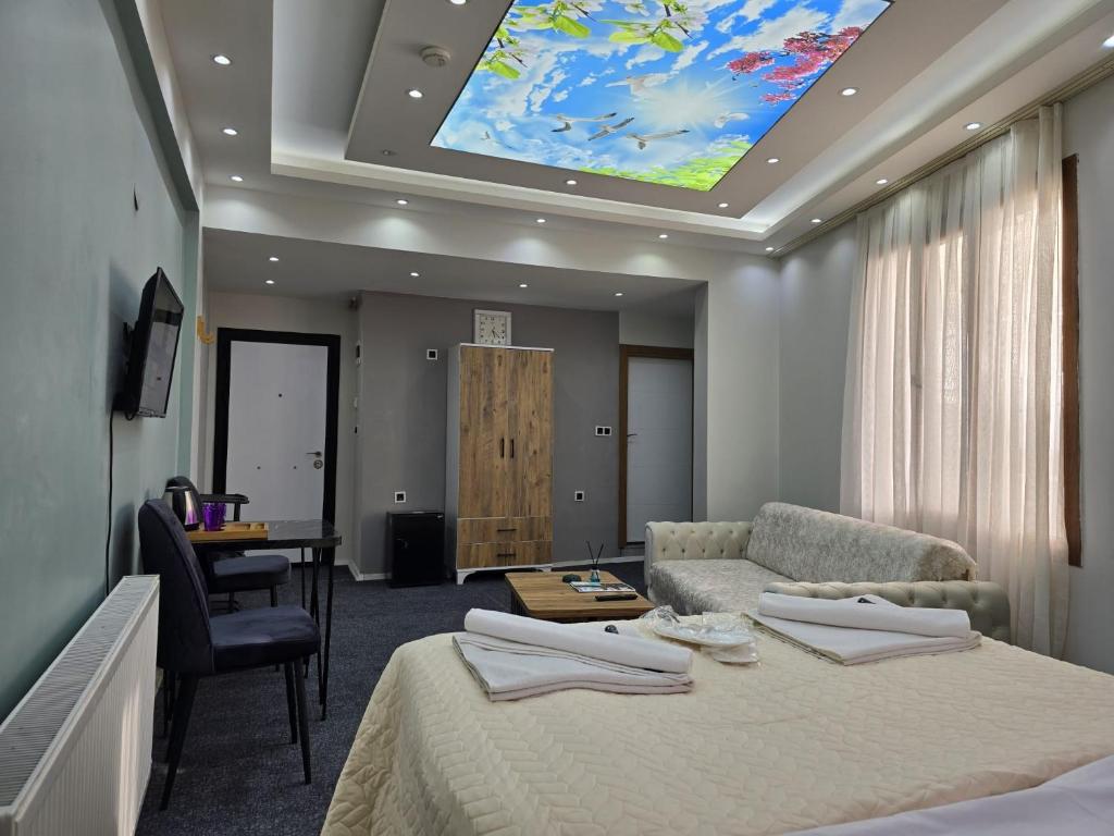 Postel nebo postele na pokoji v ubytování Uyu Room Uşak Otel