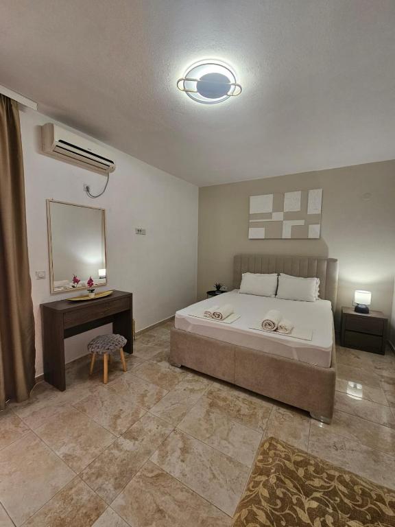 Postel nebo postele na pokoji v ubytování MD APARTMENTS