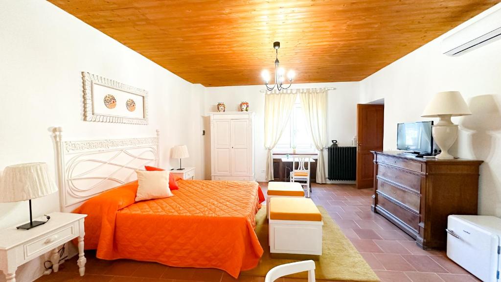 Postel nebo postele na pokoji v ubytování B&B La Terazza Sul Cielo di Maratea