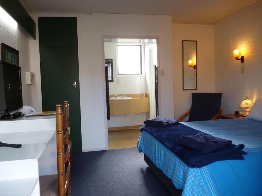 Postel nebo postele na pokoji v ubytování Orana Motor Inn & Restaurant