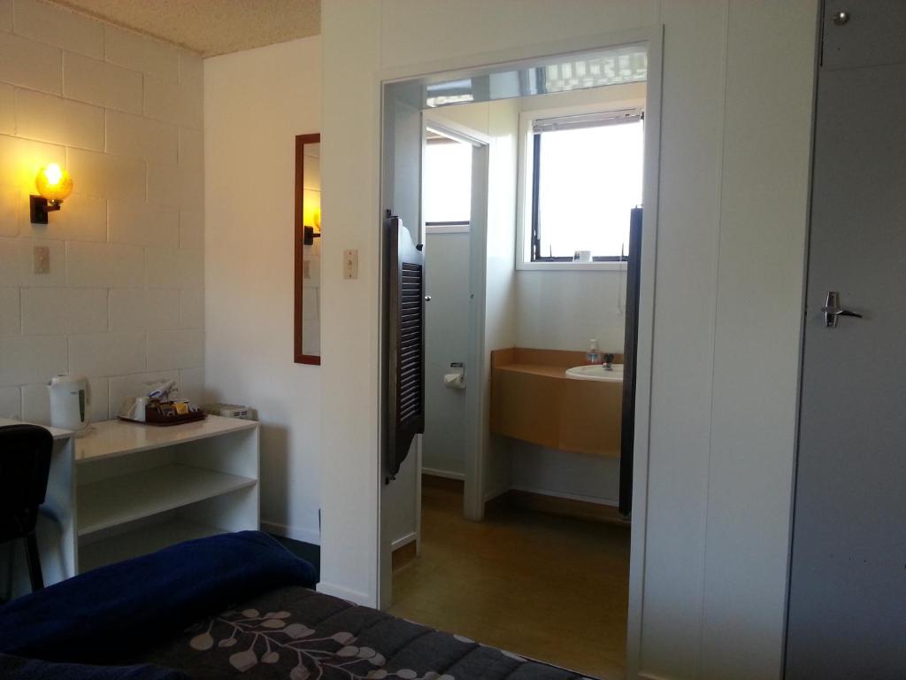 Postel nebo postele na pokoji v ubytování Orana Motor Inn & Restaurant