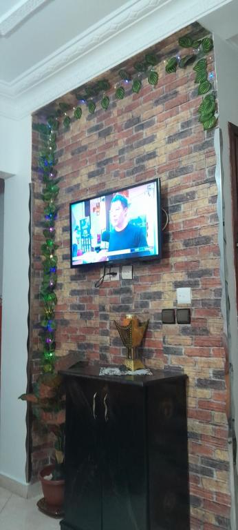 TV a/nebo společenská místnost v ubytování Av kadi ayad