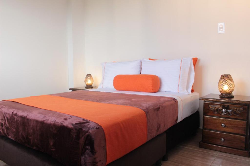 Postel nebo postele na pokoji v ubytování Hotel Campestre Sueño del Abuelo