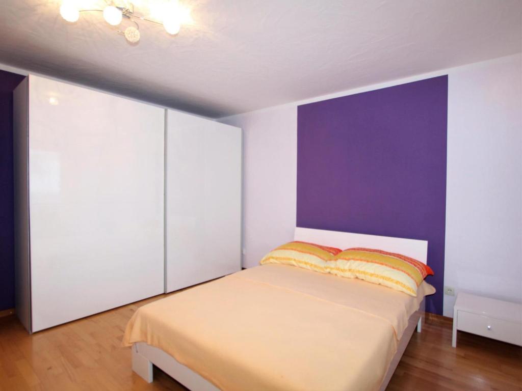 Postel nebo postele na pokoji v ubytování Mangartblick