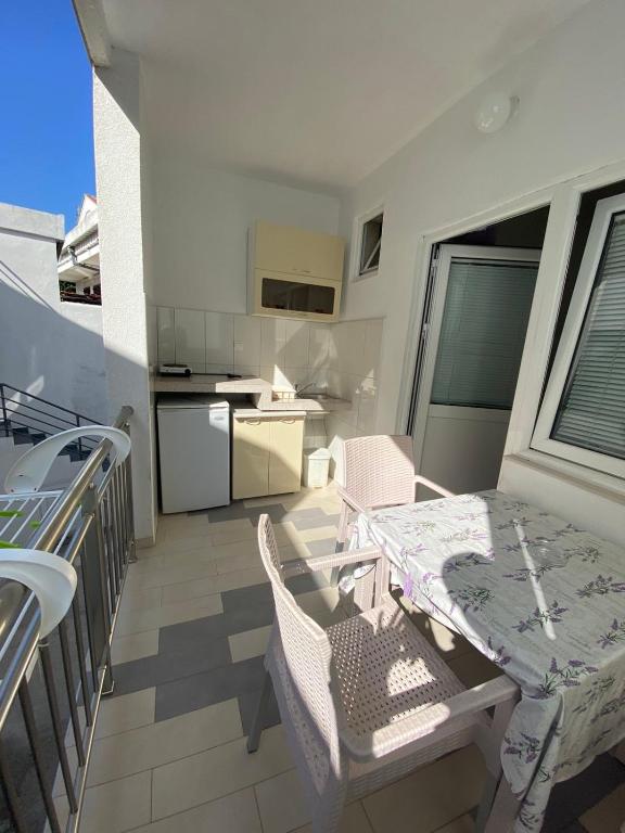 Kuchyň nebo kuchyňský kout v ubytování Apartmani Resetar