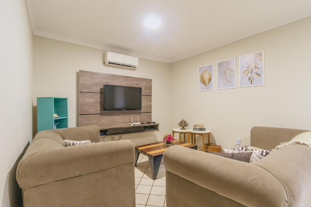 TV a/nebo společenská místnost v ubytování Casa temporada Condomínio Clube, até 10 pessoas.