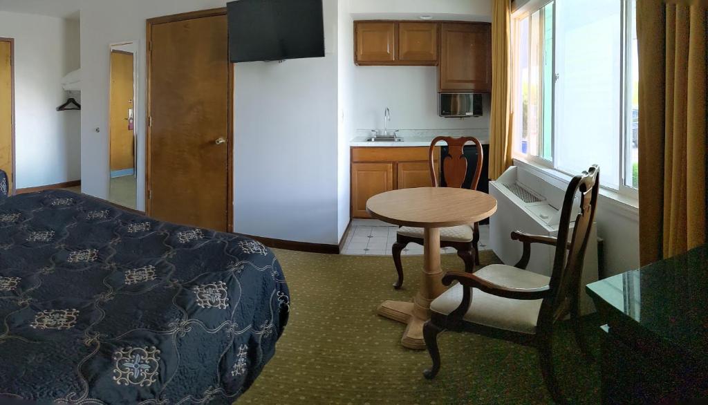 Kuchyň nebo kuchyňský kout v ubytování South Side Inn - Burlington