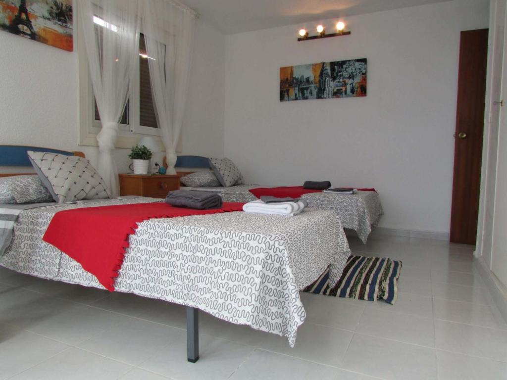 Postel nebo postele na pokoji v ubytování Apartamento Maestro Parada