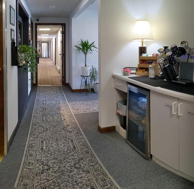 Kuchyň nebo kuchyňský kout v ubytování South Side Inn - Burlington