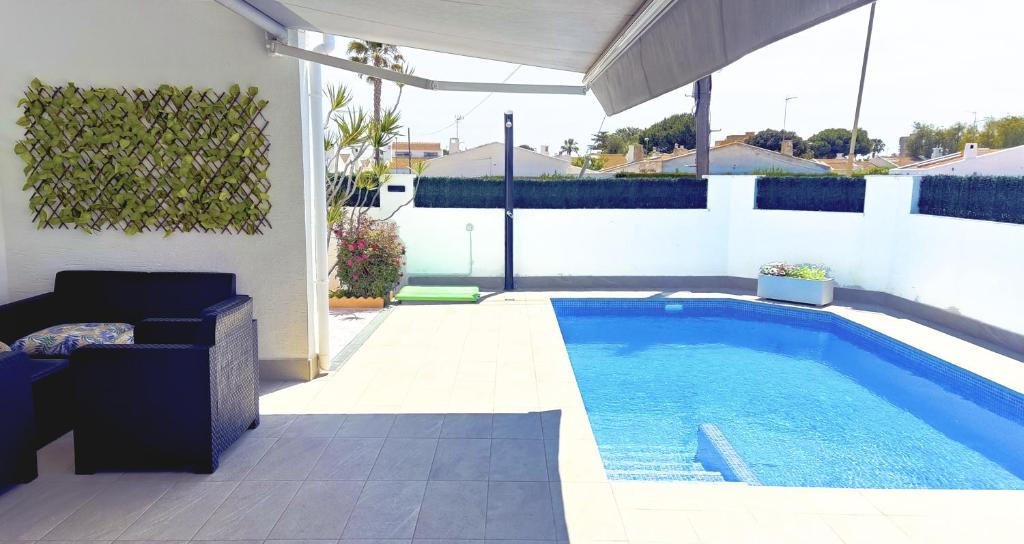 Bazén v ubytování CASA SOLEADA Piscina CLIMATIZADA y PRIVADA nebo v jeho okolí