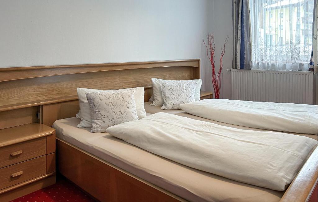 Posteľ alebo postele v izbe v ubytovaní Gemuetliche Ferienwohnung
