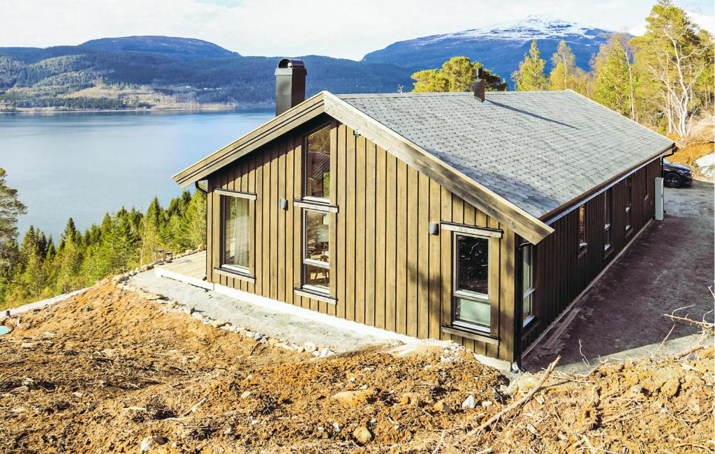 a house under construction with a view of a lake at 3 Bedroom Amazing Home In Åfarnes in Åfarnes