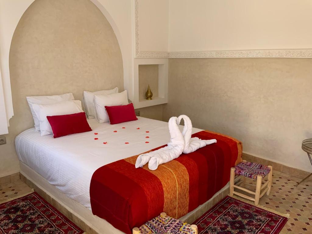 Postel nebo postele na pokoji v ubytování Riad Magnolia&SPA