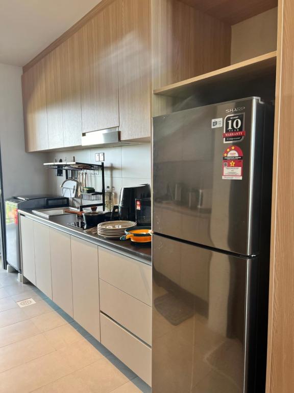 Kuchyň nebo kuchyňský kout v ubytování SS Staycation @Roxy Sematan Beach Apt