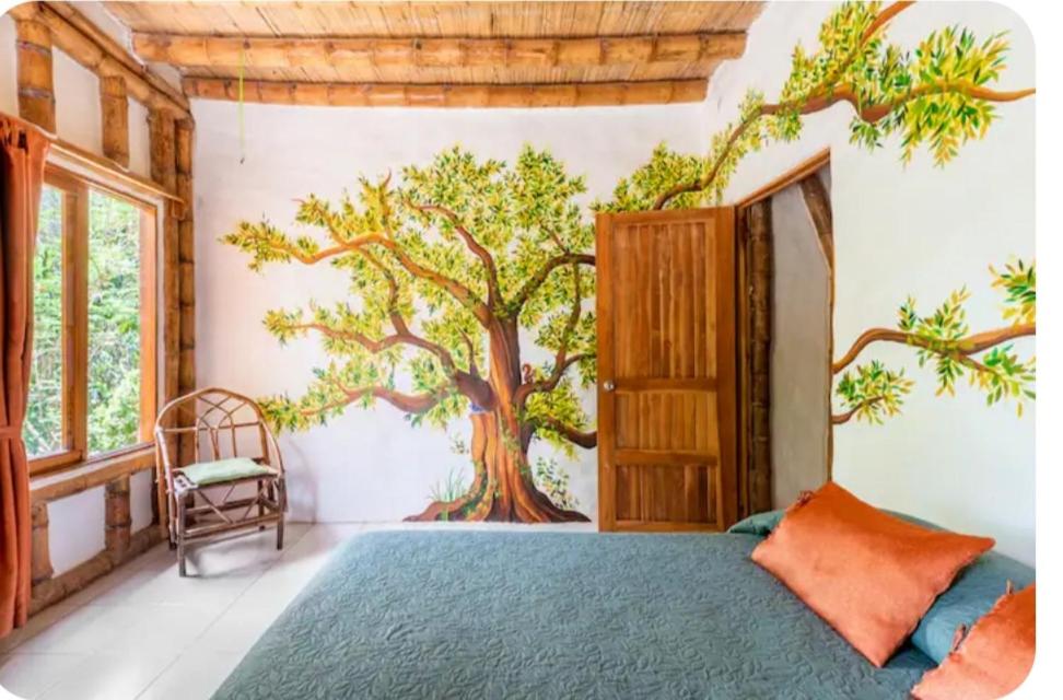 Postel nebo postele na pokoji v ubytování Casa BAMBÚ, enjoy nature
