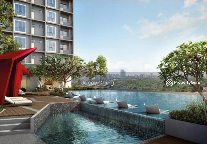 a swimming pool in front of a building at vista sentul residence share apartment with host in Kuala Lumpur