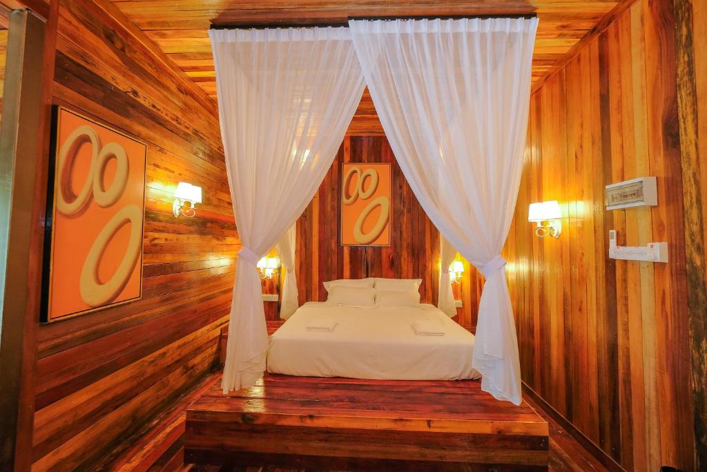 Postel nebo postele na pokoji v ubytování Woodcookies Guesthouse